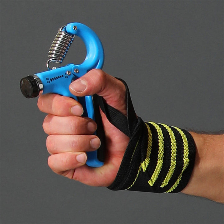 Person squeezing a blue adjustable hand gripper with wrist wrap support