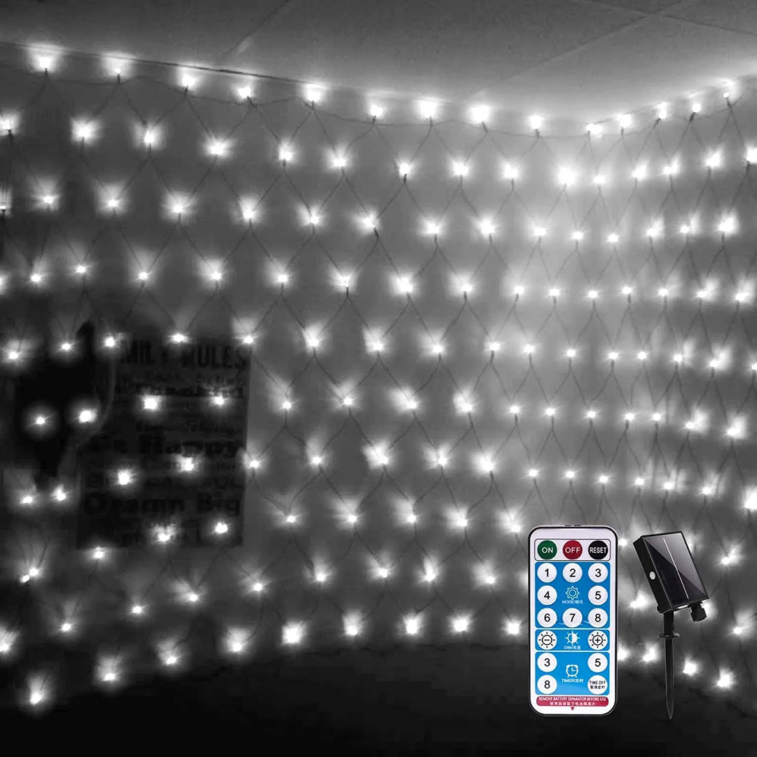 Close-up view of bright white solar net lights hanging indoors
