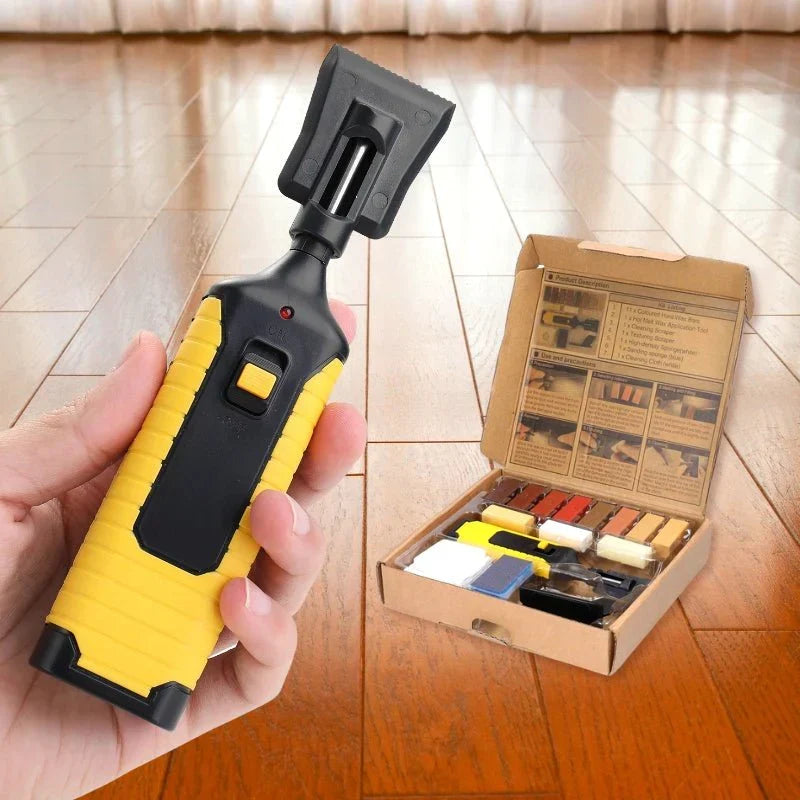 Hand holding the electric wax melting tool from the floor repair kit