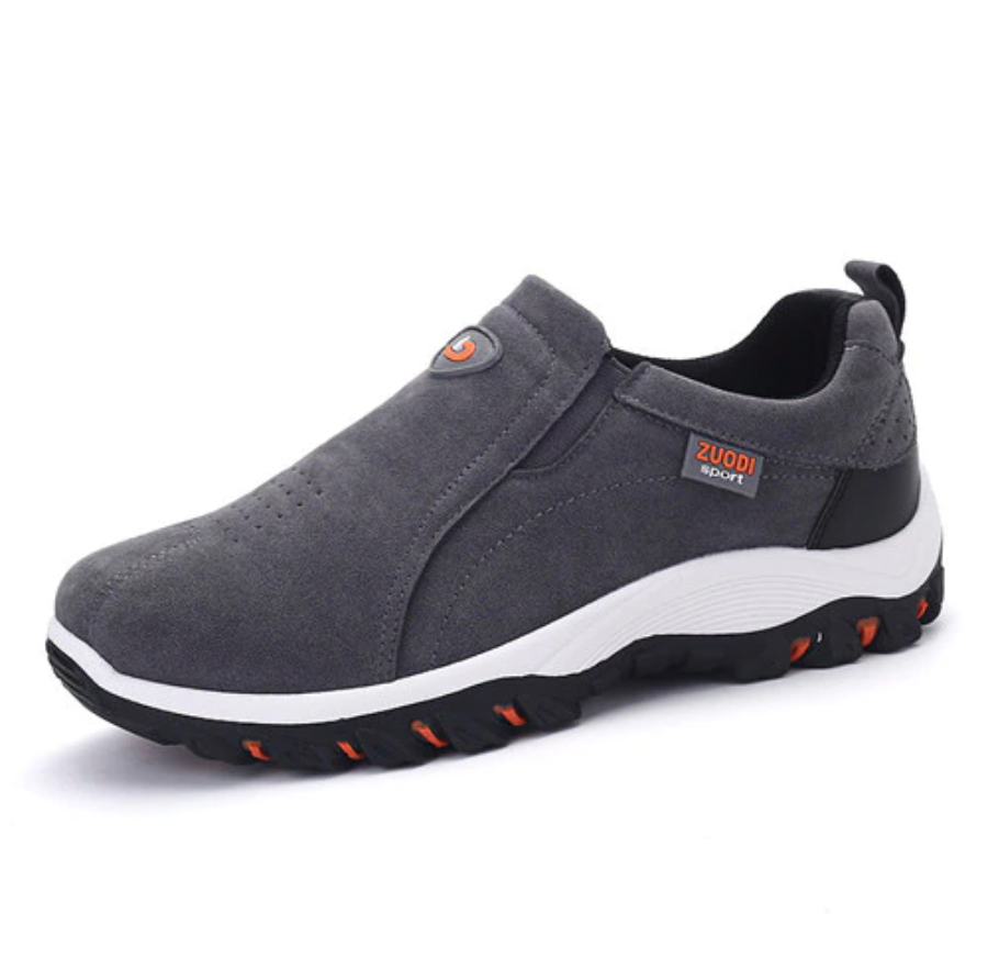 Side angle of men's orthopedic walking slip-on shoes showcasing arch support