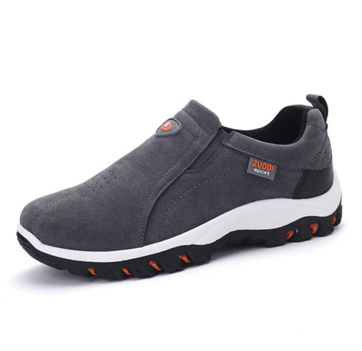 Side angle of men's orthopedic walking slip-on shoes showcasing arch support