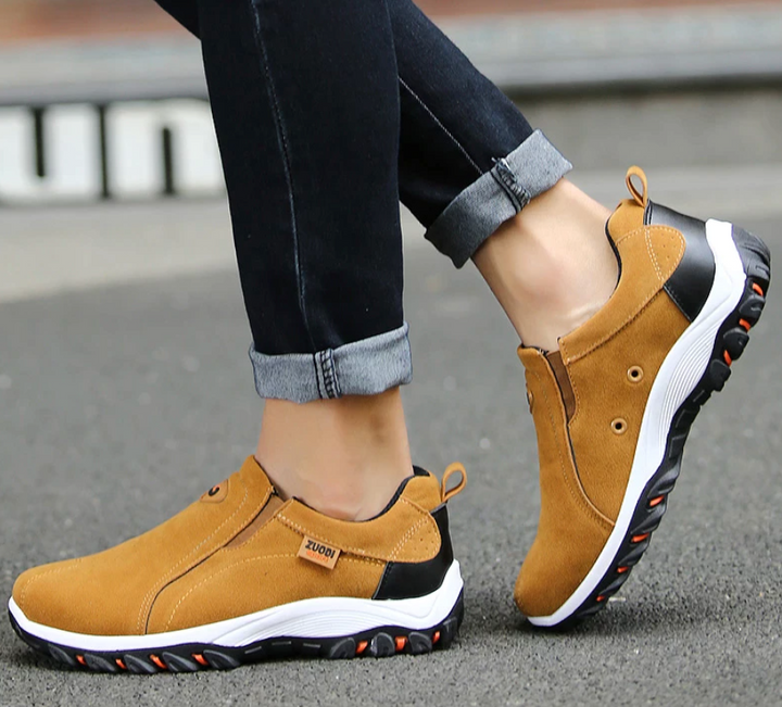 Men's orthopedic walking shoes flexed to show sole flexibility