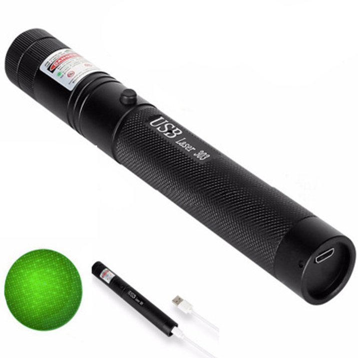 Long range green laser pointer pen showing a bright beam outdoors