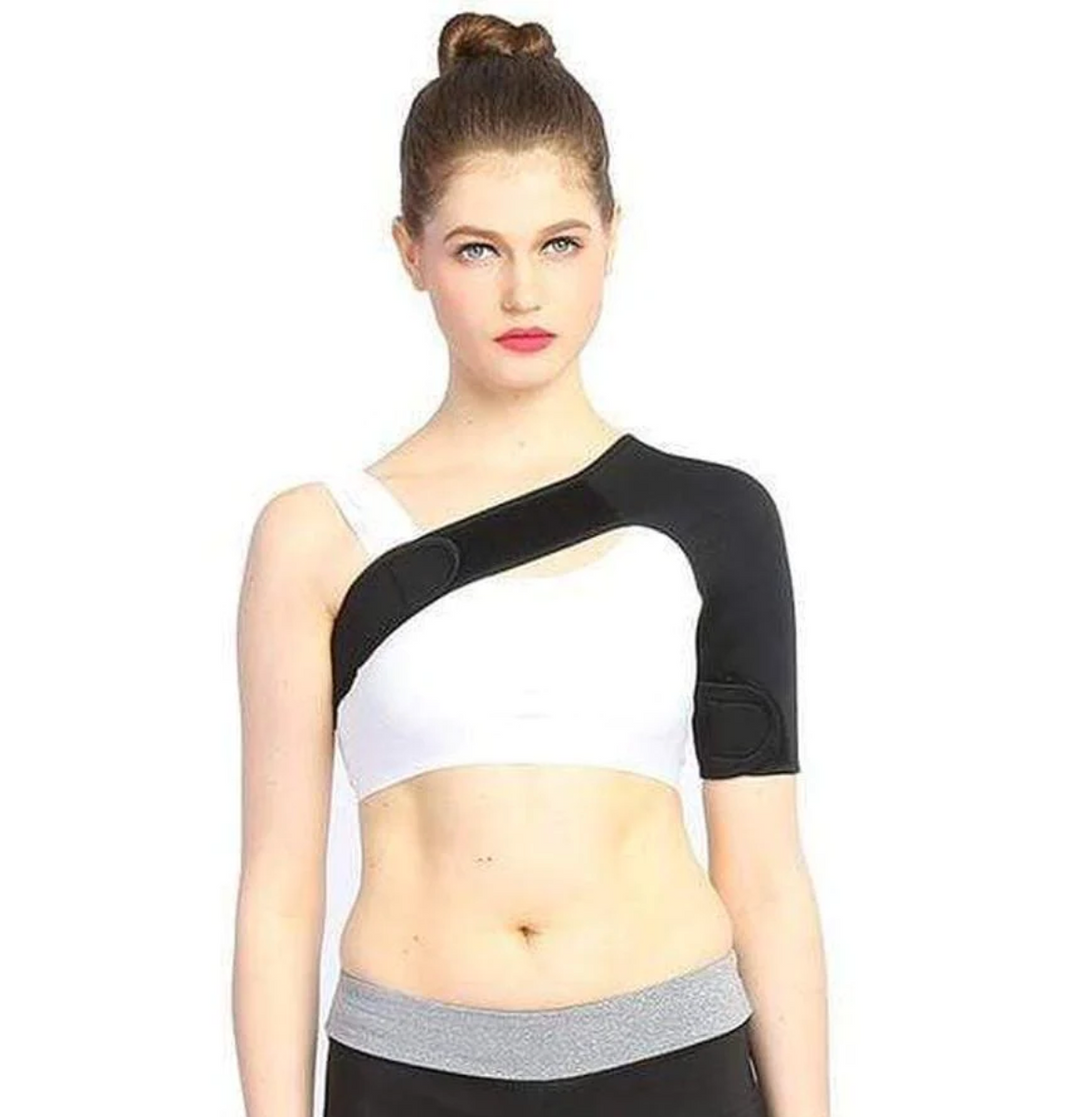 Close-up of woman wearing shoulder brace over white top