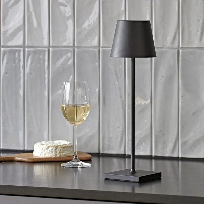 Elegant home decor cordless lamp styled on a wooden bookshelf