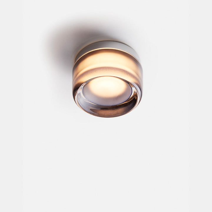 Interior lighting concept featuring the compact lamp in a minimalist living room