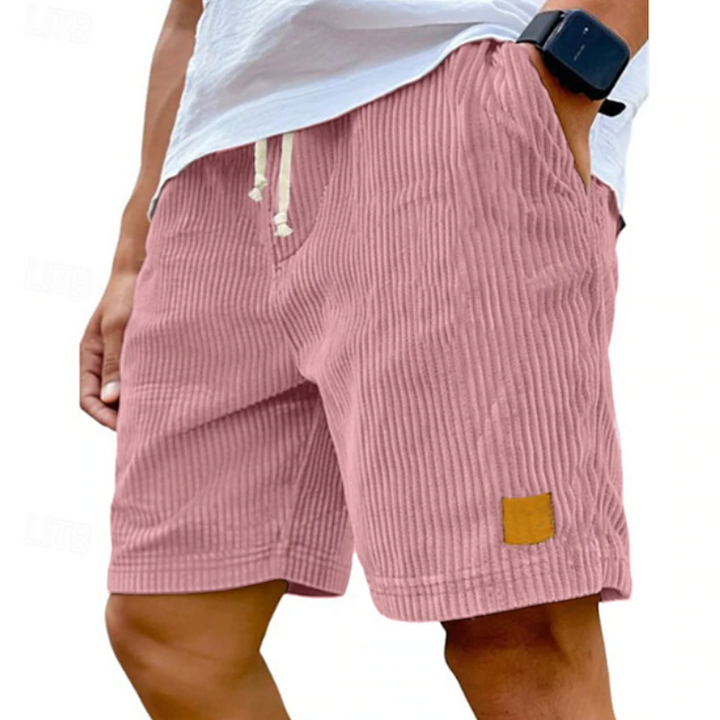 Side profile of mens textured shorts styled for beach wear and casual days