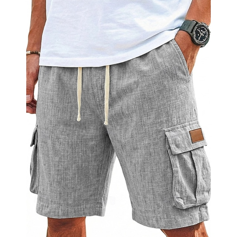 Close-up view of grey summer cargo shorts with drawstring