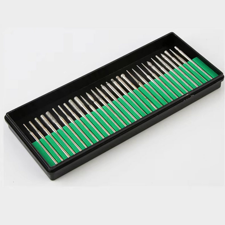 Organized storage box containing various precision drill bits and accessories
