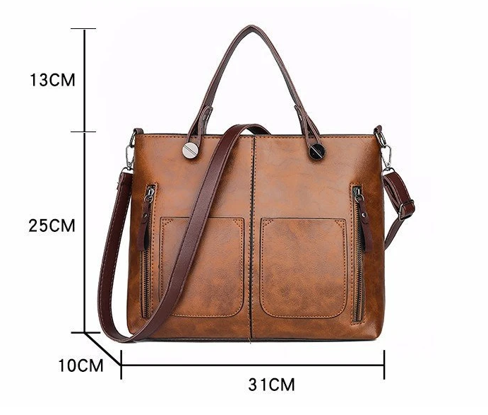 Flat lay of the multi-pocket handbag showcasing organizational compartments and lining