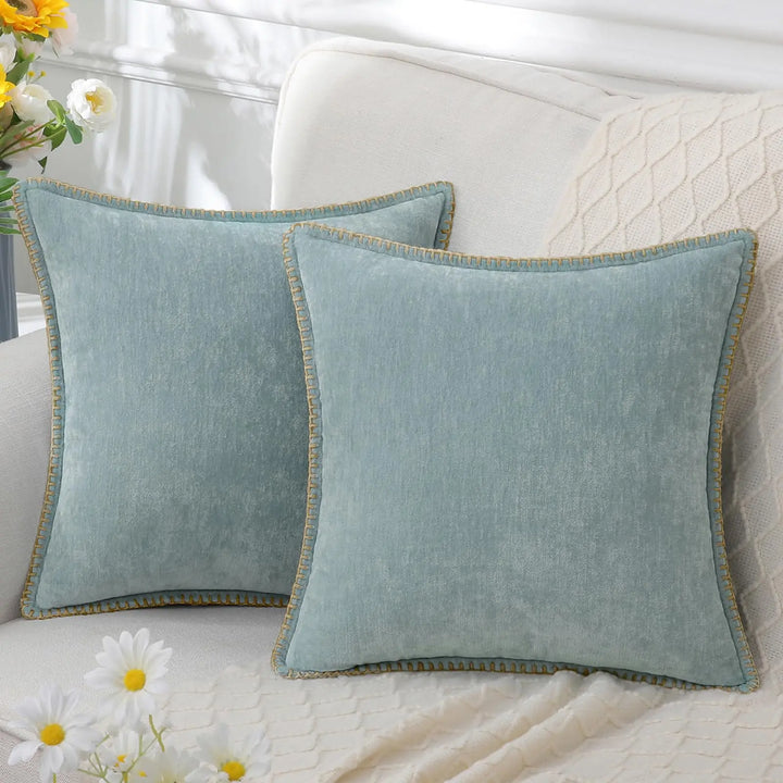 Living room sofa decorated with textured chenille throw pillows