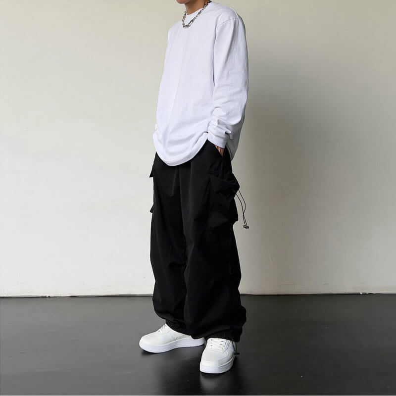 Utility trousers fabric texture closeup showing durable cotton blend material