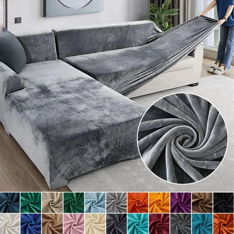 Demonstrating the stretchable fabric of the universal sofa cover in dark grey