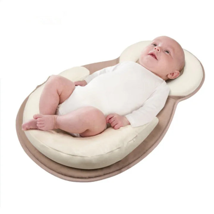 Close-up texture of plush baby lounger fabric designed for delicate newborn skin