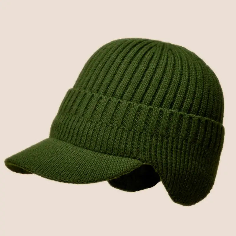 Flat lay of winter hat accessories in black and grey colors