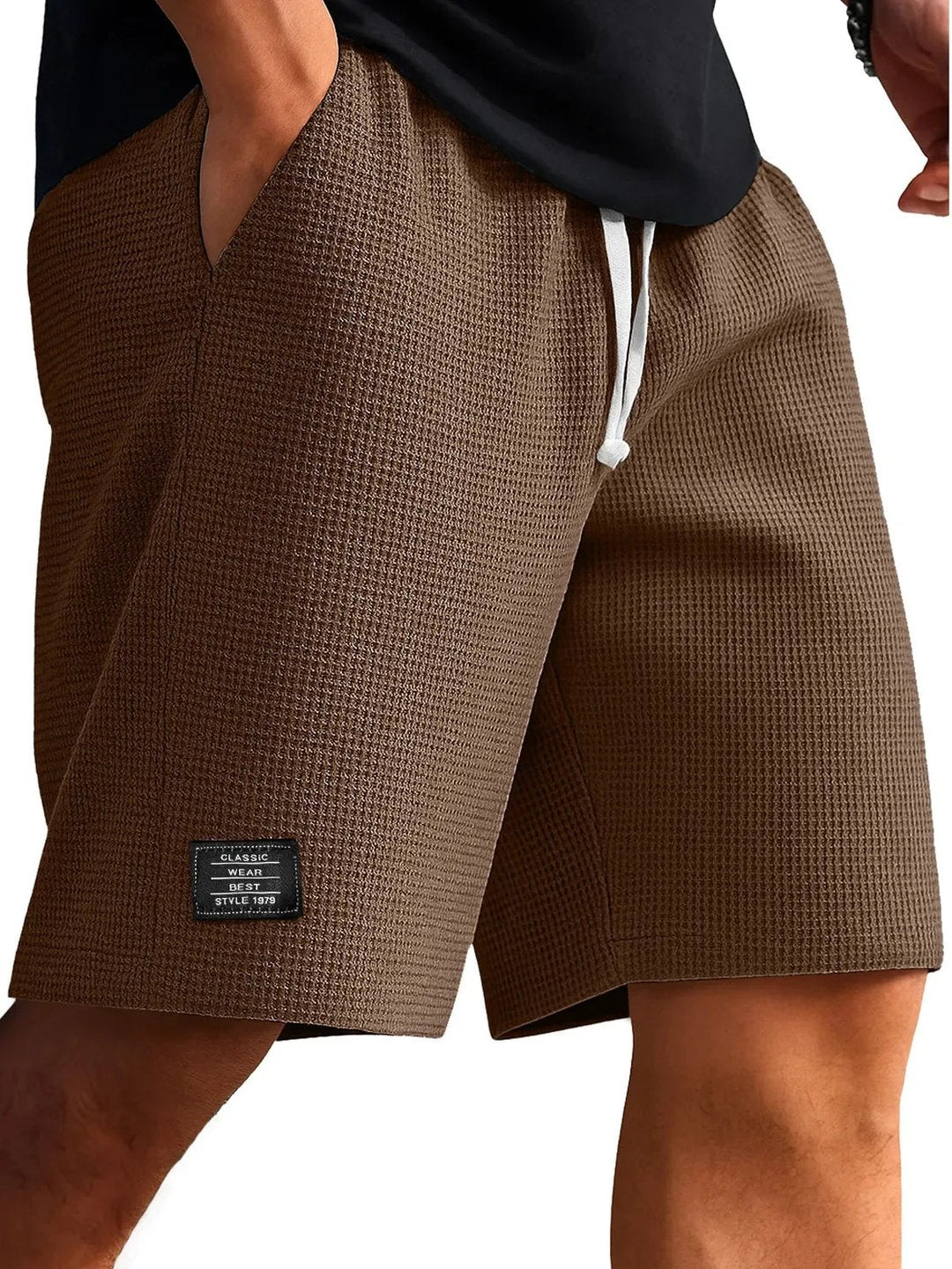 Close-up of lightweight fabric texture on men's casual summer shorts