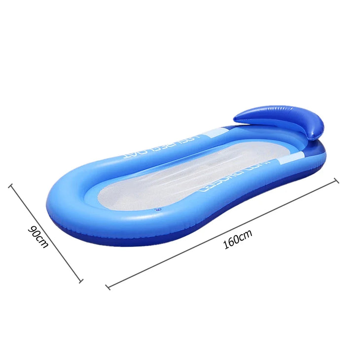 Person relaxing on a luxury pool lounger and water hammock in the sunshine