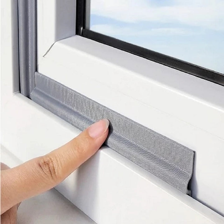 Close-up of Gray SealGuard Strip applied to a window frame