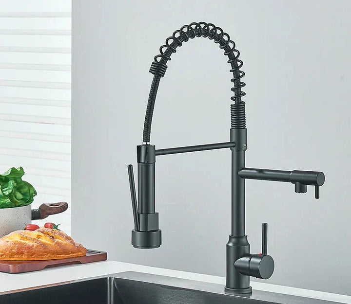 Durable metal finish of the modern kitchen hardware installed on white sink
