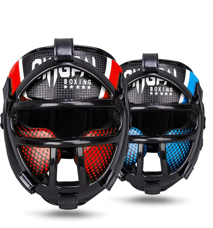 Front view of red and blue boxing head guards showing protective face bars and padding