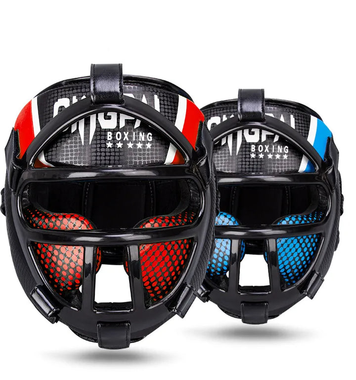 Front view of red and blue boxing head guards showing protective face bars and padding