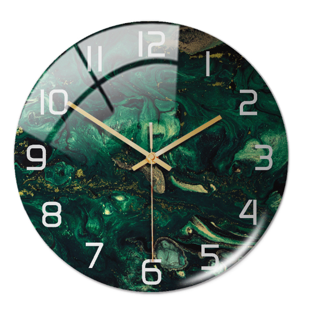 Close-up view of the green marble wall clock face with white numbers