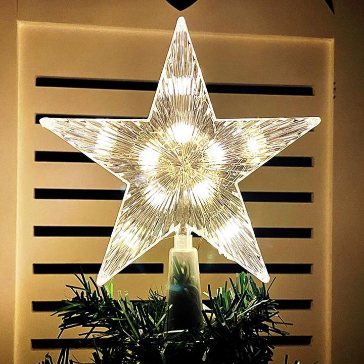 Close-up view of the glowing multi-faceted Starlit tree topper