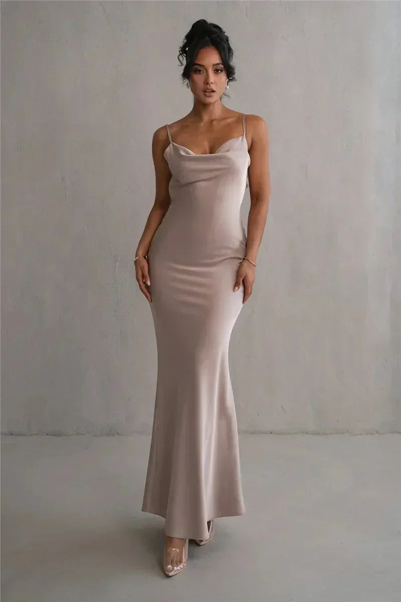 Full length front view of woman in flowing evening gown