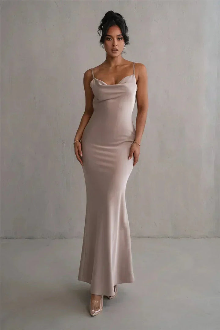 Full length front view of woman in flowing evening gown