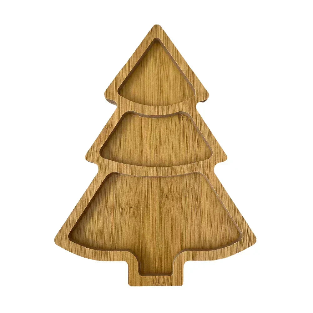 Festive Christmas tree shaped kitchenware resting against winter decor elements
