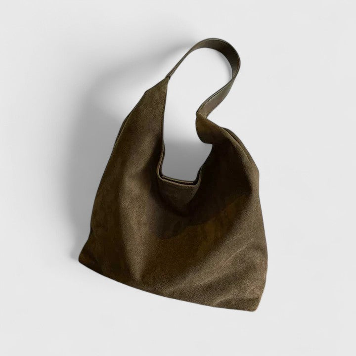 Flat lay of women chic purse styled with casual daily essentials and accessories