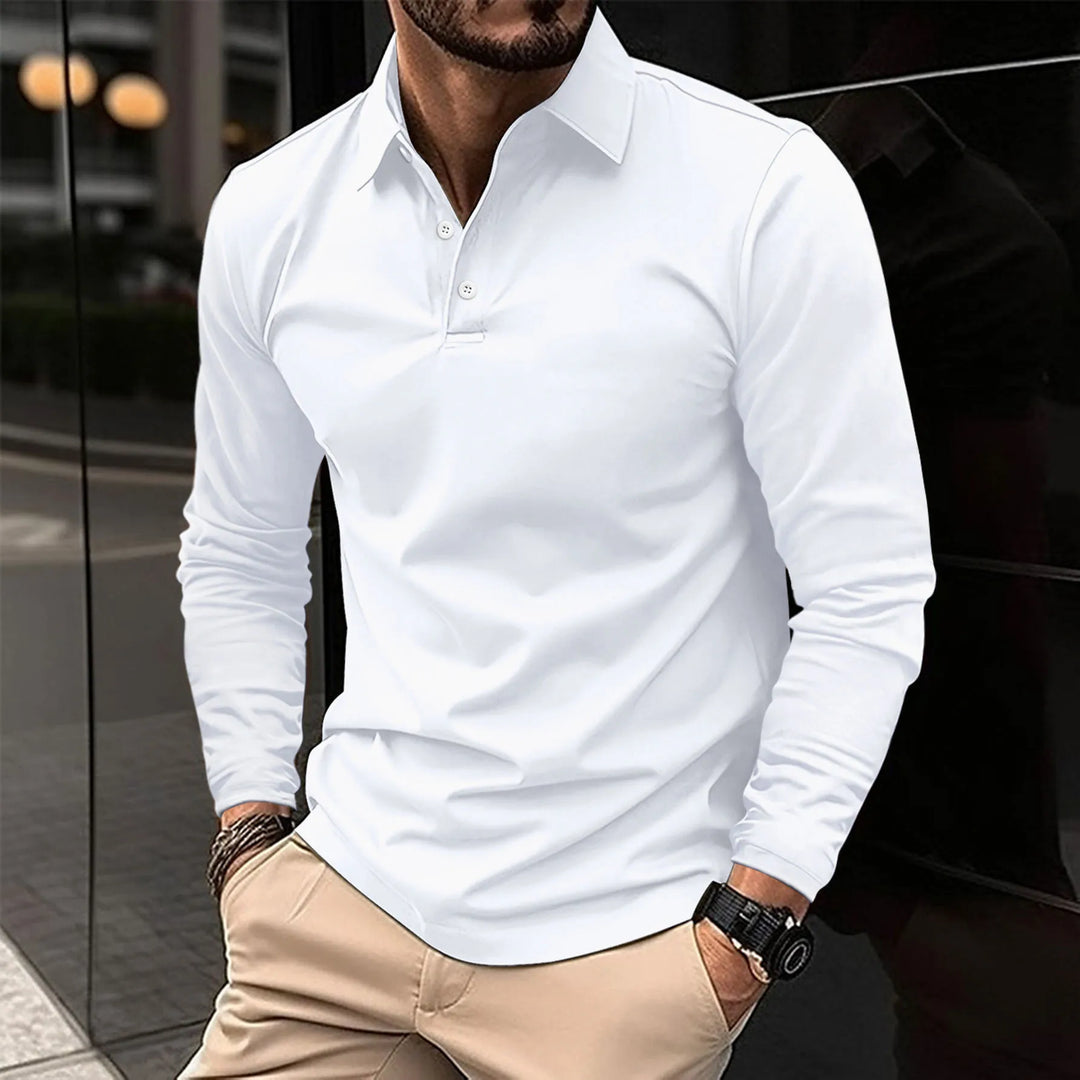 Man wearing white long-sleeved polo shirt with khaki trousers