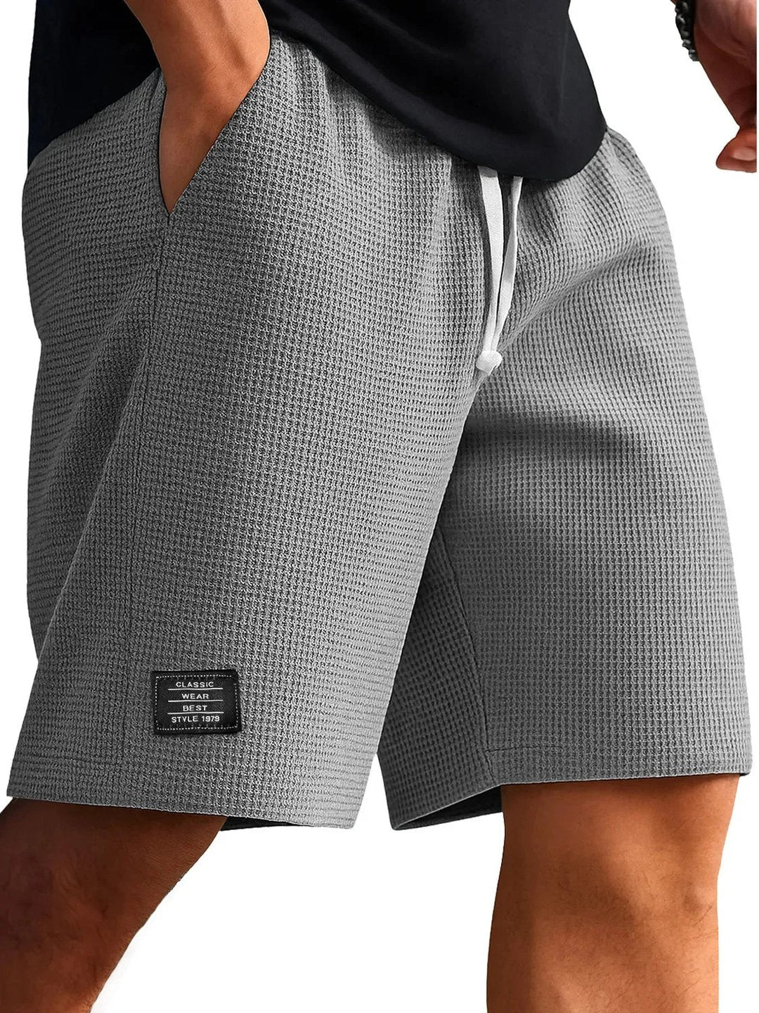 Side angle view of men's breathable summer shorts showing casual activewear fit