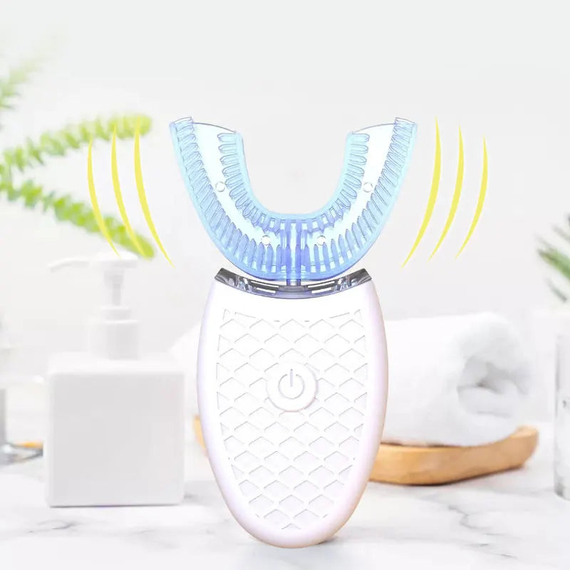 Wireless sonic electric toothbrush in white with U-shaped head on a bathroom counter