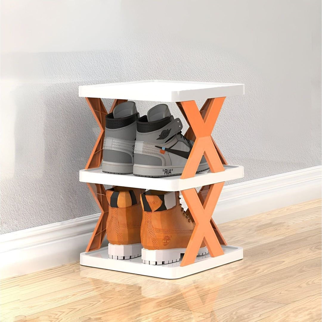 Orange and white foldable shoe rack holding high-top sneakers
