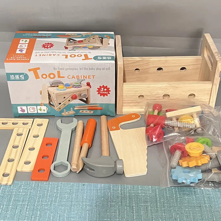 Montessori wooden toy construction set featuring various miniature tools in a box