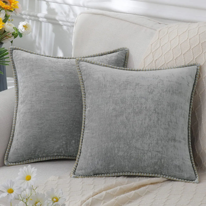 Detailed view of the elegant stitched edge on a square throw pillow cover