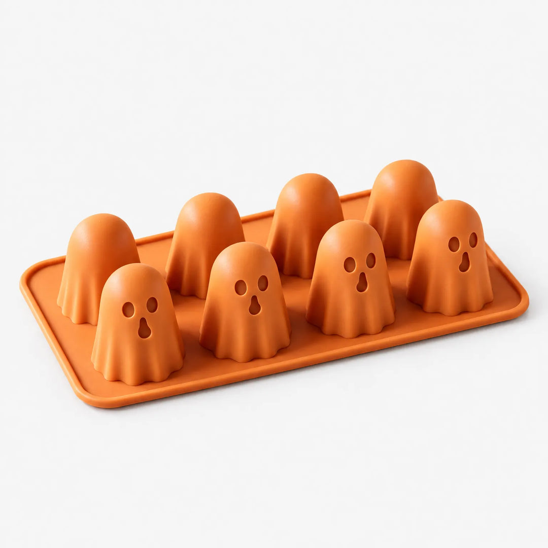 Orange silicone ghost baking tray displayed against a clean white background