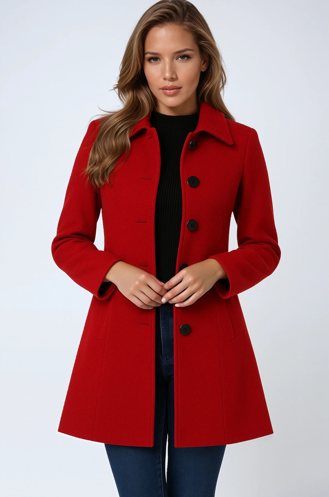 Model wearing a red single-breasted trench coat with black sweater