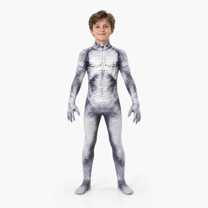 Studio portrait of a young boy wearing a full body skeleton printed costume