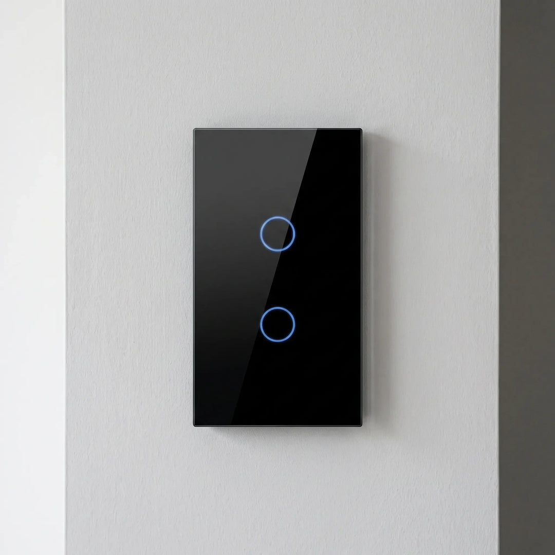 Black smart touch light switch mounted on a light grey wall
