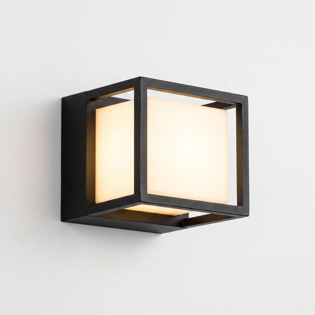 Close-up view of the minimalist square smart wall sconce attached to a white wall.
