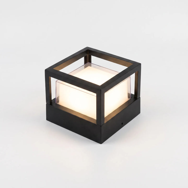 Home automation exterior lighting fixture casting vibrant colors outdoors