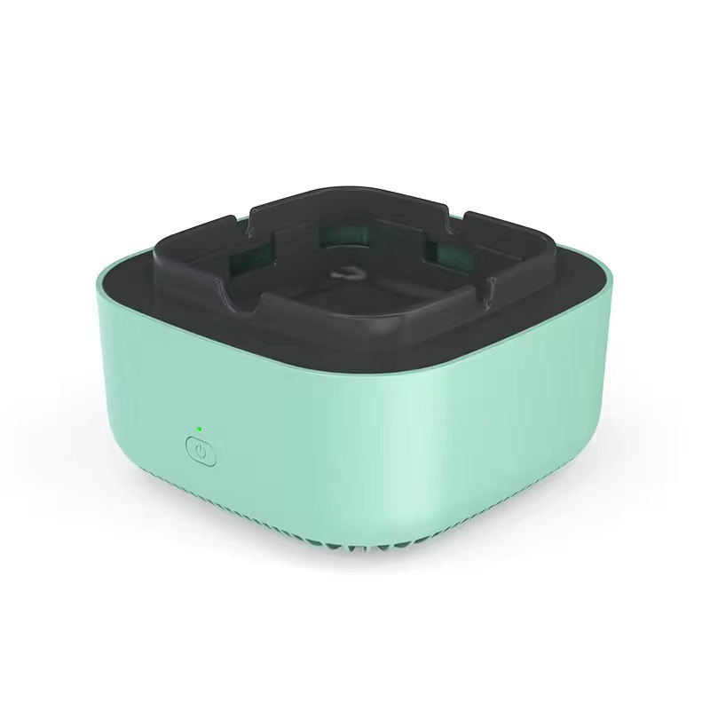 Smart ashtray air purifier placed on office desk for clean indoor air