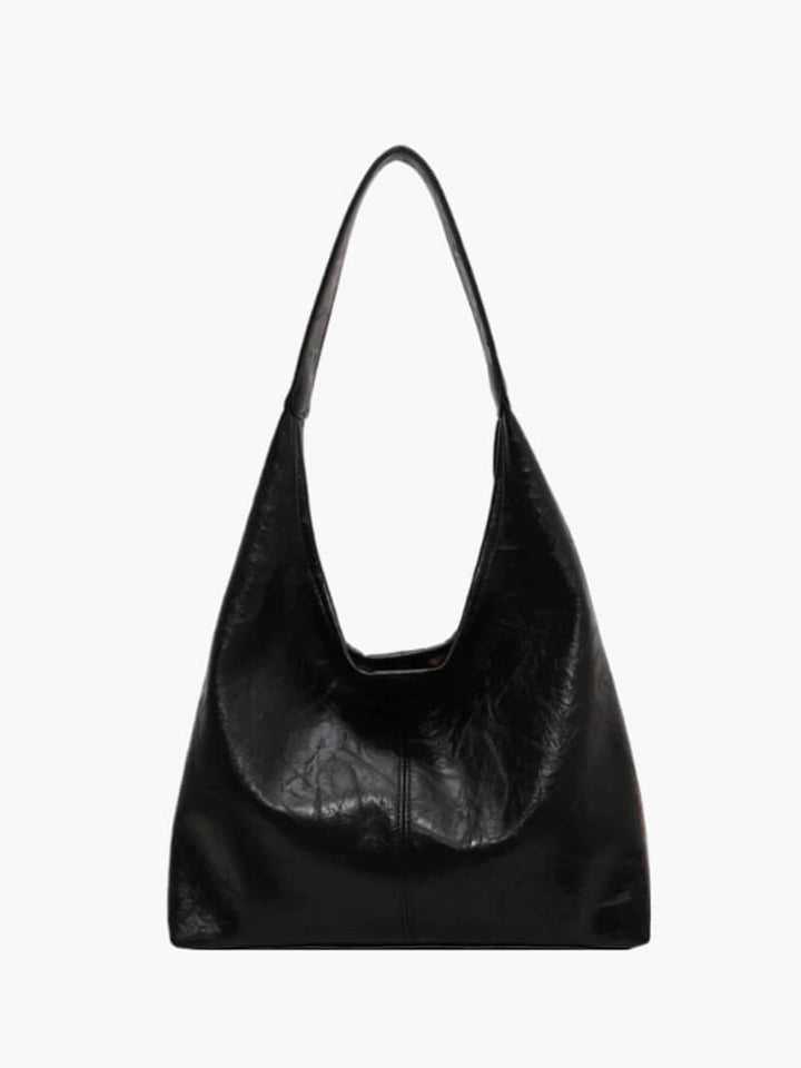 Black women's minimalist shoulder bag front view on white background