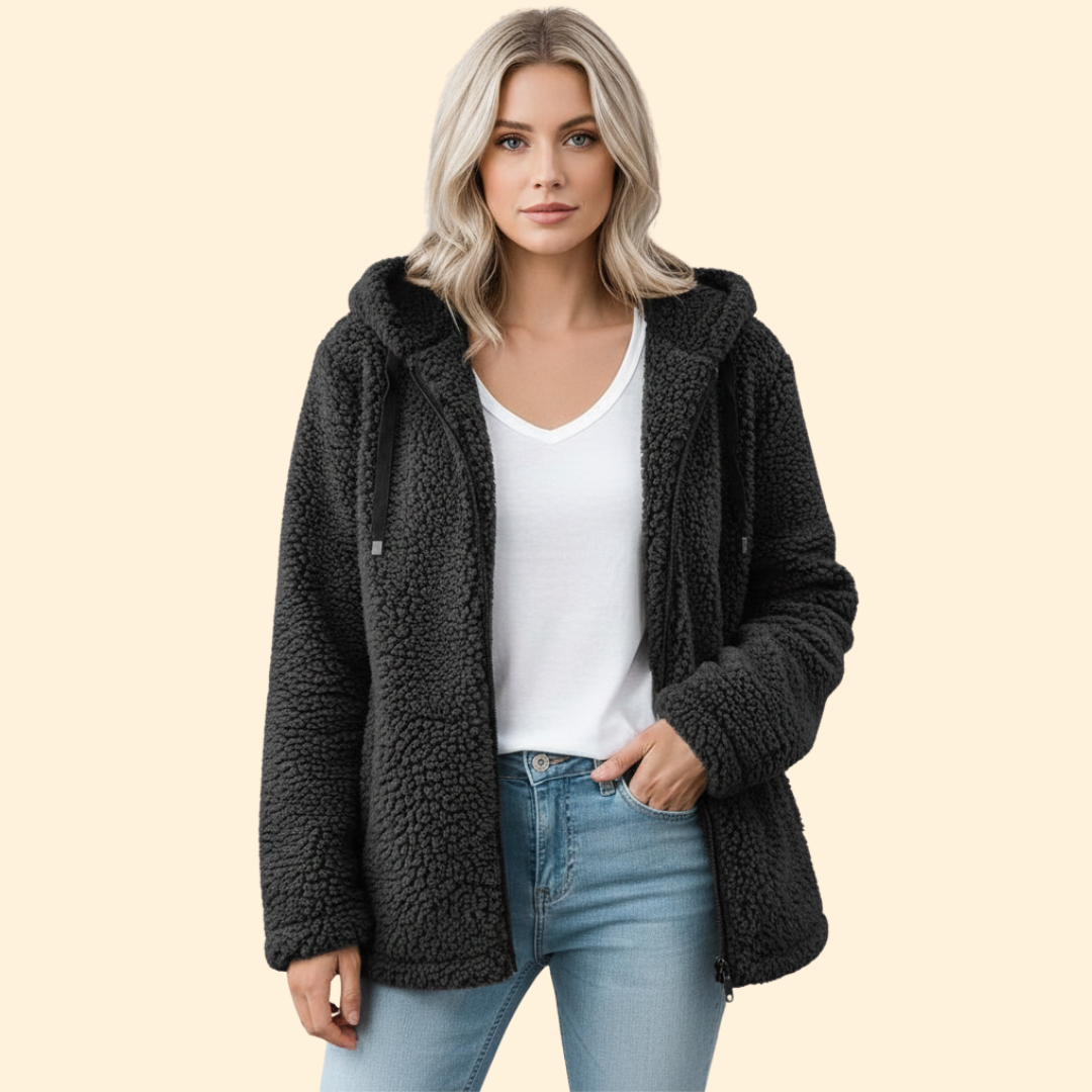 Detail of deep hood on cozy fleece jacket for cold weather