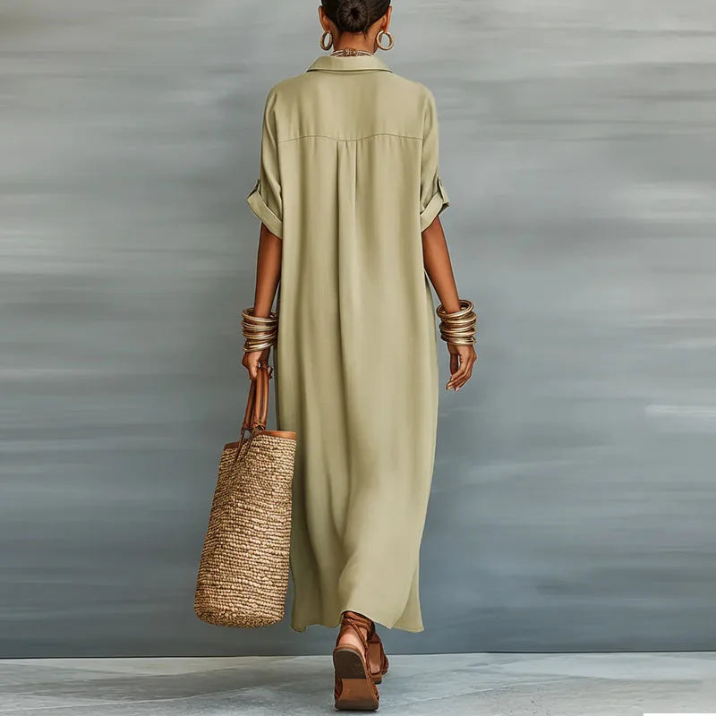 Back view of a woman wearing a khaki maxi shirt dress