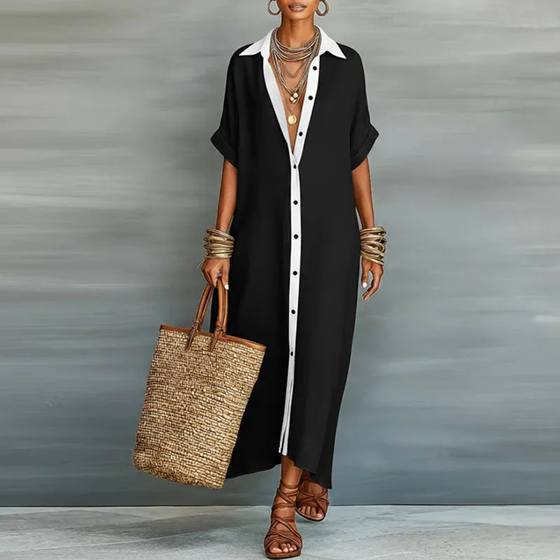 Close-up of lapel collar and front button details on long shirt dress