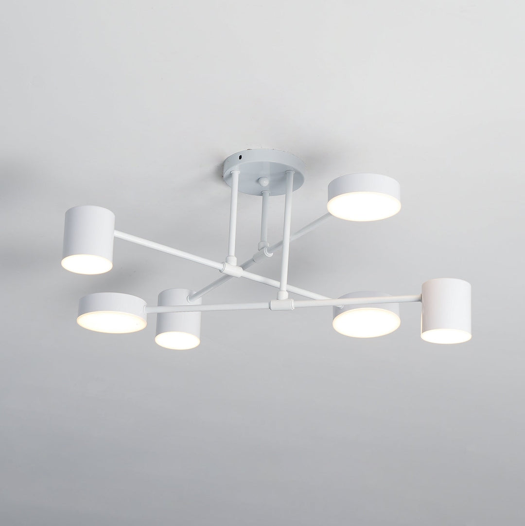 Architectural shot of the modern metal chandelier illuminating a hallway