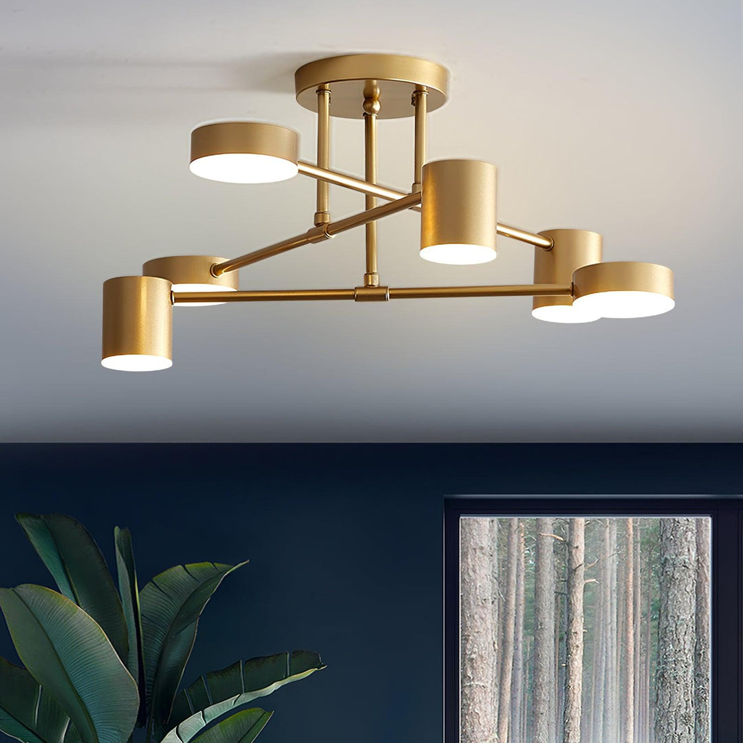 Gold Sputnik design ceiling light mounted on a modern living room ceiling